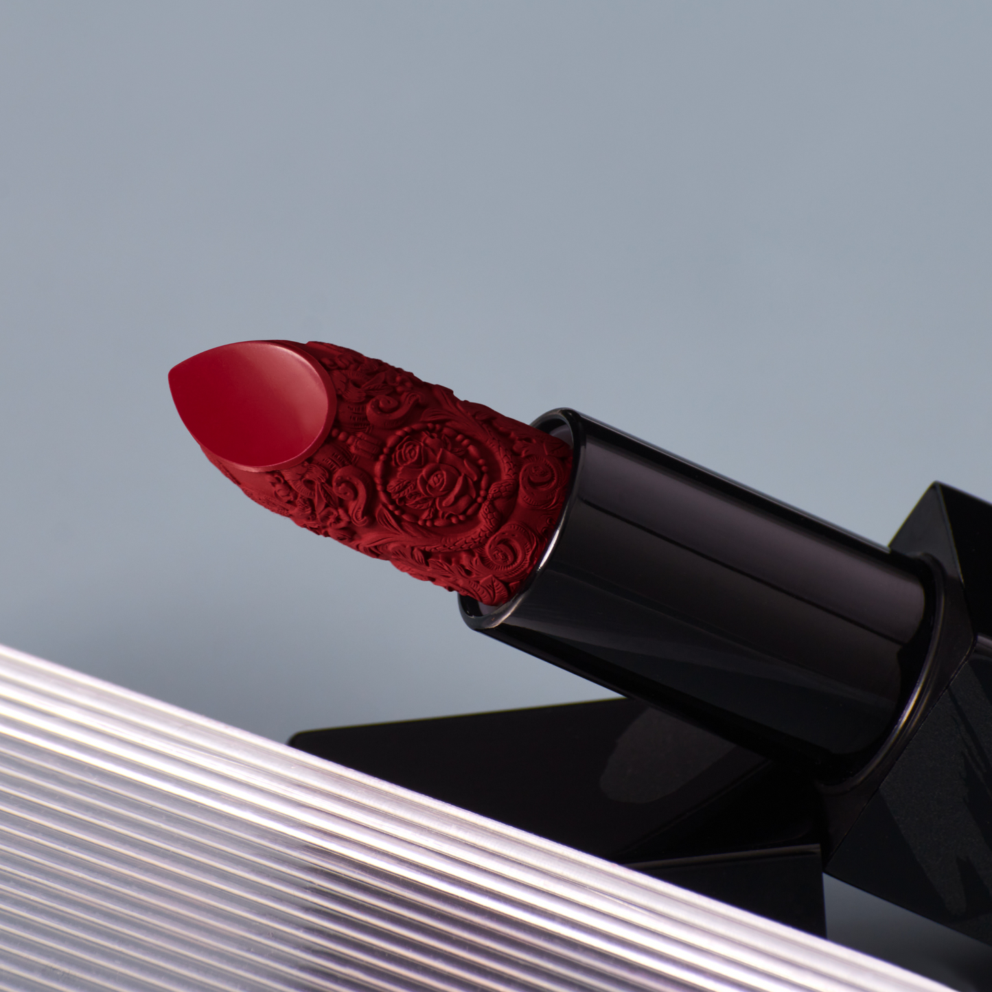 Bright red carved lipstick - Honeypot