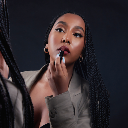 Deep red lipstick for dark skin