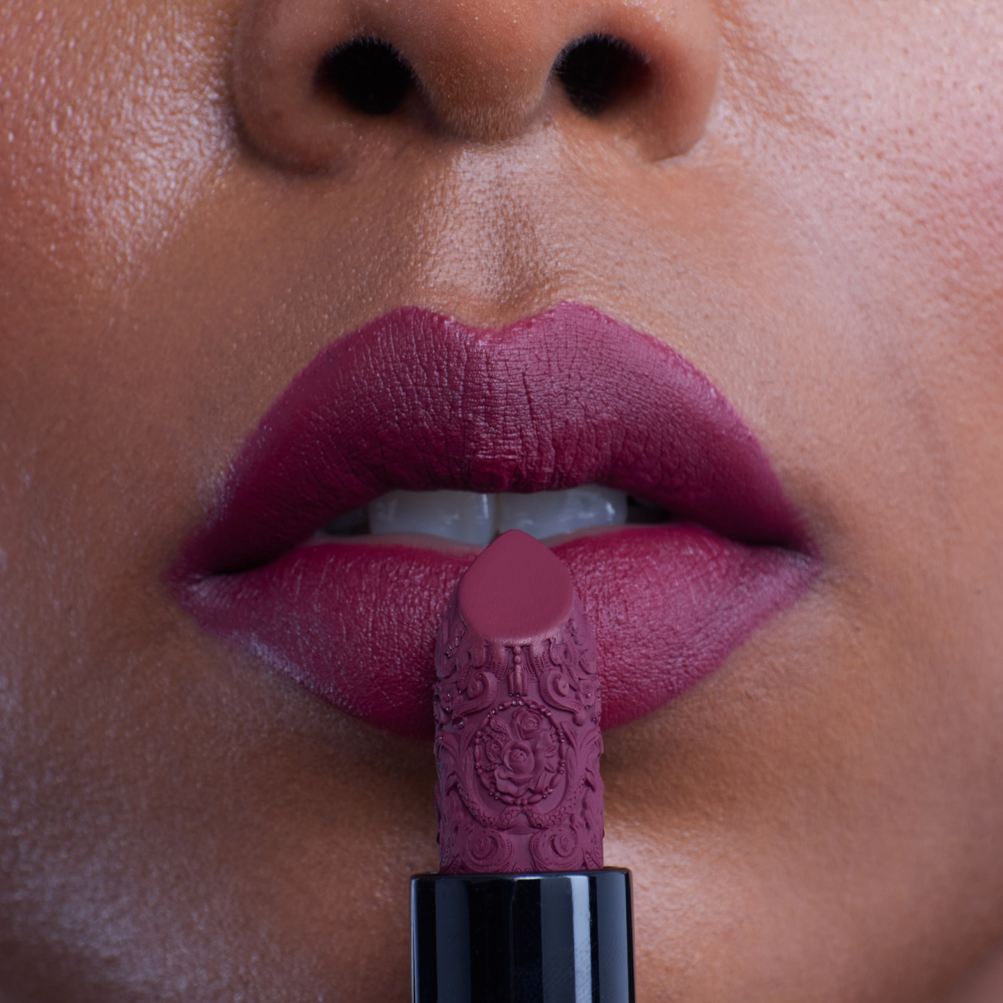 Dark purple plum lipstick for dark skin