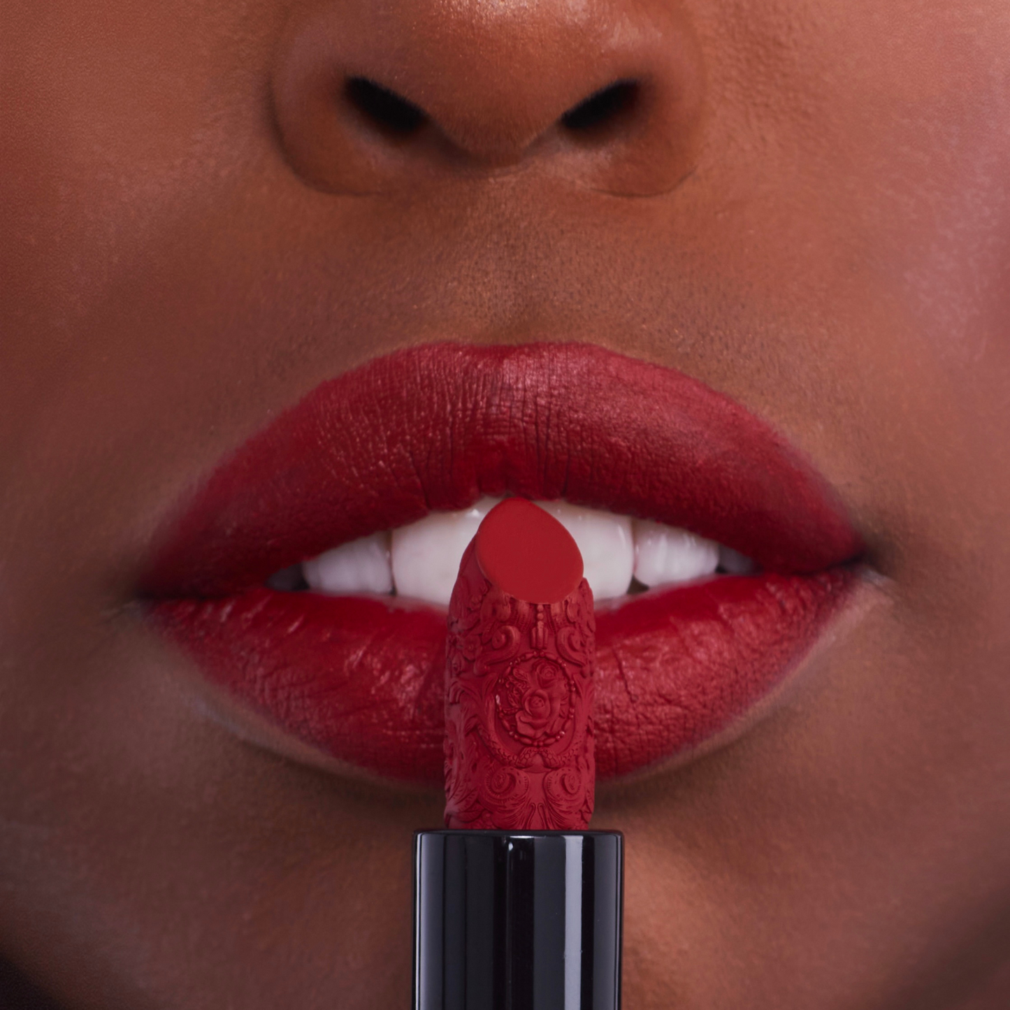 Bright red lipstick for black skin