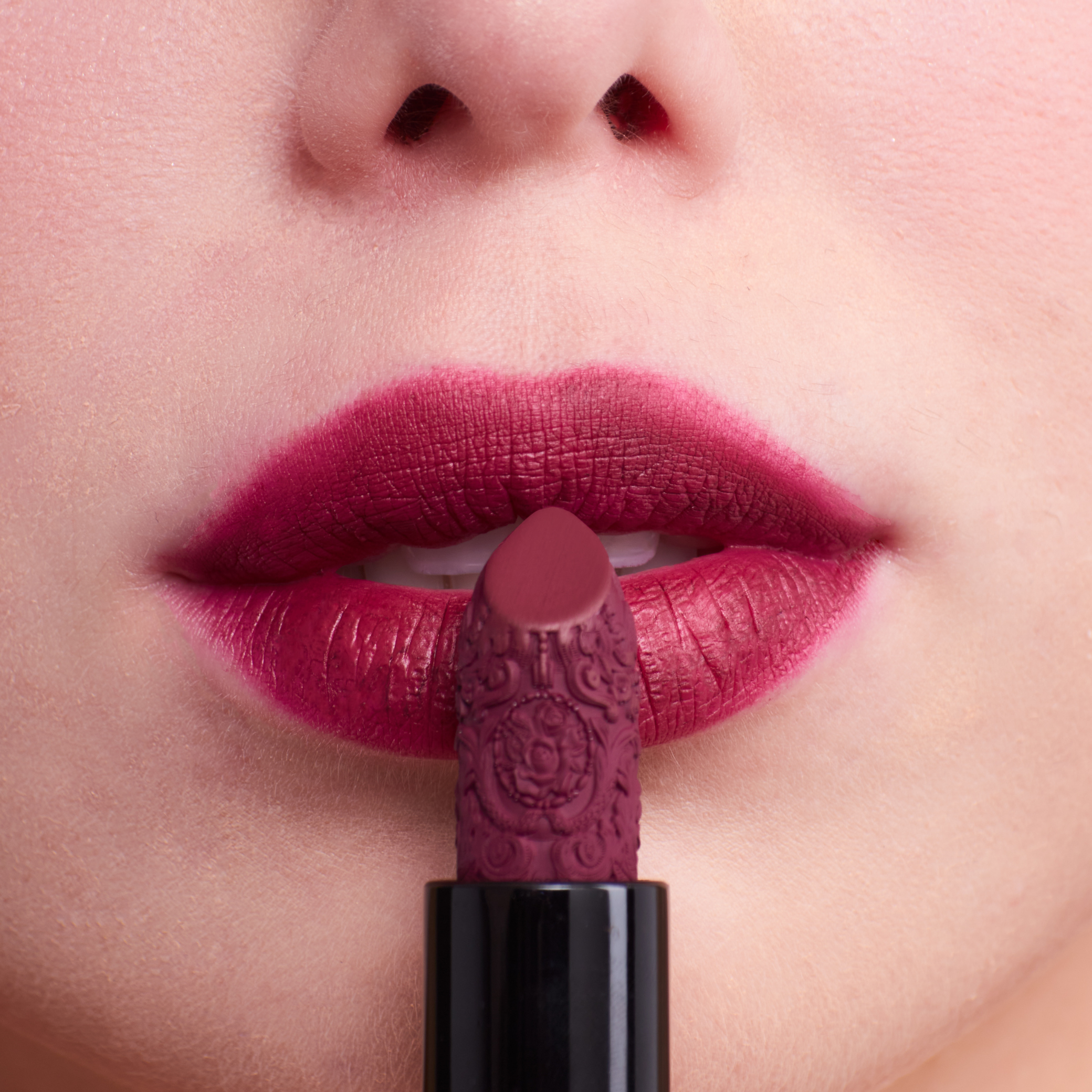 Dark purple plum lipstick for white skin